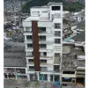 Estado actual del edificio Shalom III sobre la Avenida Santander en Manizales.