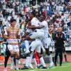 Los jugadores celebran una de las cuatro anotaciones del Once Caldas. 