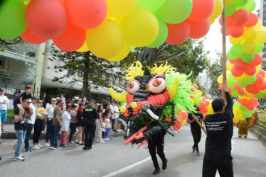 Las figuras gigantes hechas con globlos fueron la sensación del desfile. 