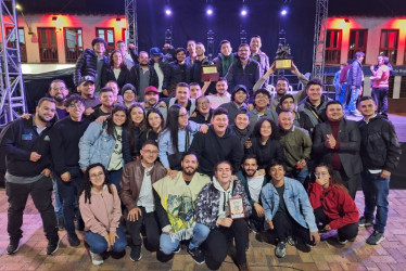 Los músicos de la Banda Municipal de Manizales celebran su doble triunfo.